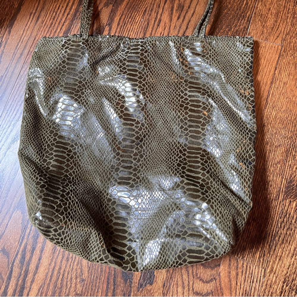 Soft leather bag. Long stripe to go over the shoulder.